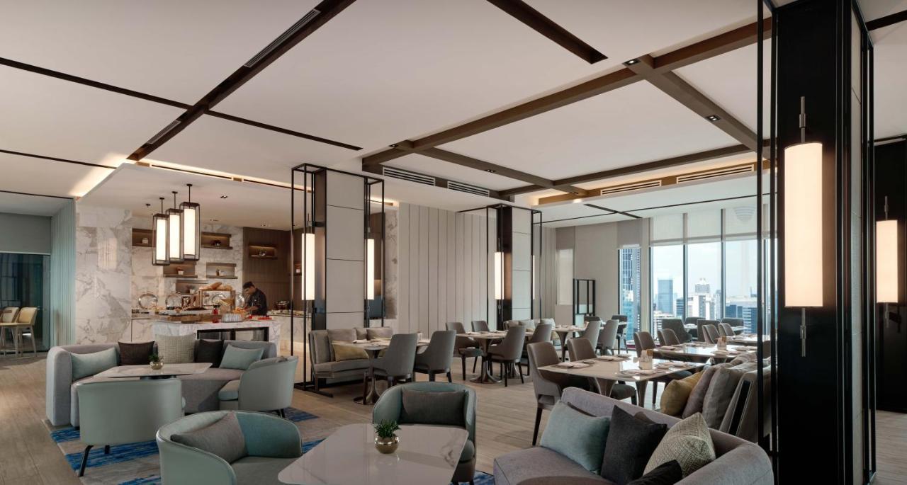 Pan Pacific Serviced Suites Kuala Lumpur Exterior foto The Club at Changi Airport