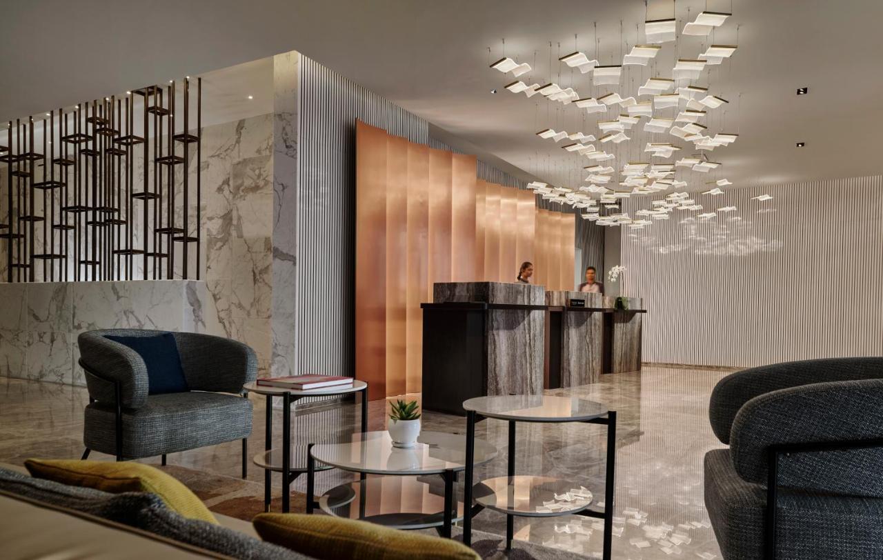 Pan Pacific Serviced Suites Kuala Lumpur Exterior foto The lobby of the hotel